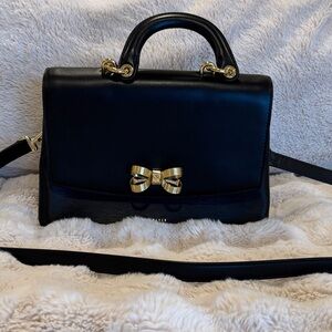 Elegant Ted Baker London Black Leather Handbag with Gold Bow